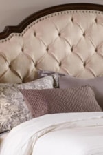 Diamond Tufting on the Upholstered Headboard gives a look of Traditional Romanticism