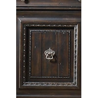 Intricate Carvings Decorate Drawer and Door Fronts