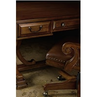 Raised Border Drawer Fronts and Graceful Scroll Arms