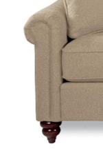 Rolled Panel Arms and Turned Legs are Subtle Touches of Formality That Enhance a Cozy Sofa