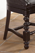 Turned legs of the Dunkirk Swivel Chair