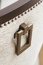 Upholstered Host Chairs Adorned with Pendant Pull Hardware