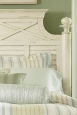 Round Finials, X Motif and White Shutter Cottage Feeling on Headboard. 