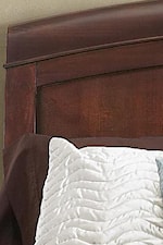 Gently Arched Headboard with Panel Design