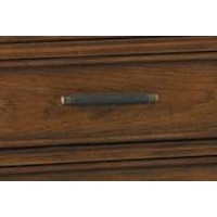 A Unique Wrapping of Faux Leather Accents the Burnished Brass Finish on Custom Drawer Pulls