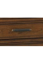 A Unique Wrapping of Faux Leather Accents the Burnished Brass Finish on Custom Drawer Pulls