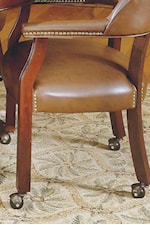 Brass Nail Head Trim and Casters on Arm Chair. 