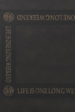 "Life is One Long Weekend" Inscription Featured on Weatherstone Table Tops