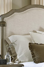 Linen-like Upholstery on the Bed's Headboard and Footboard