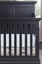 Crib has crown moulding and raised panels for additional style