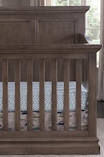 Crib has crown moulding and raised panels for additional style