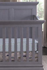 Crib has crown moulding and raised panels for additional style