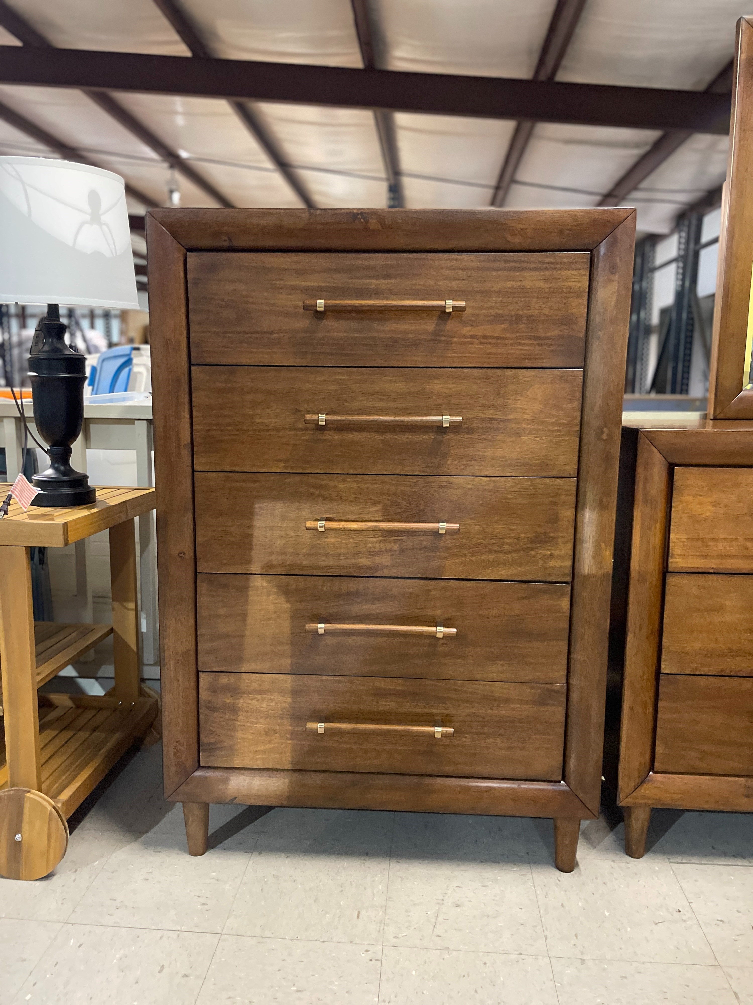 *As is
Lyncott Collection Mid-Century Modern 5-Drawer Chest by Signature Design by Ashley