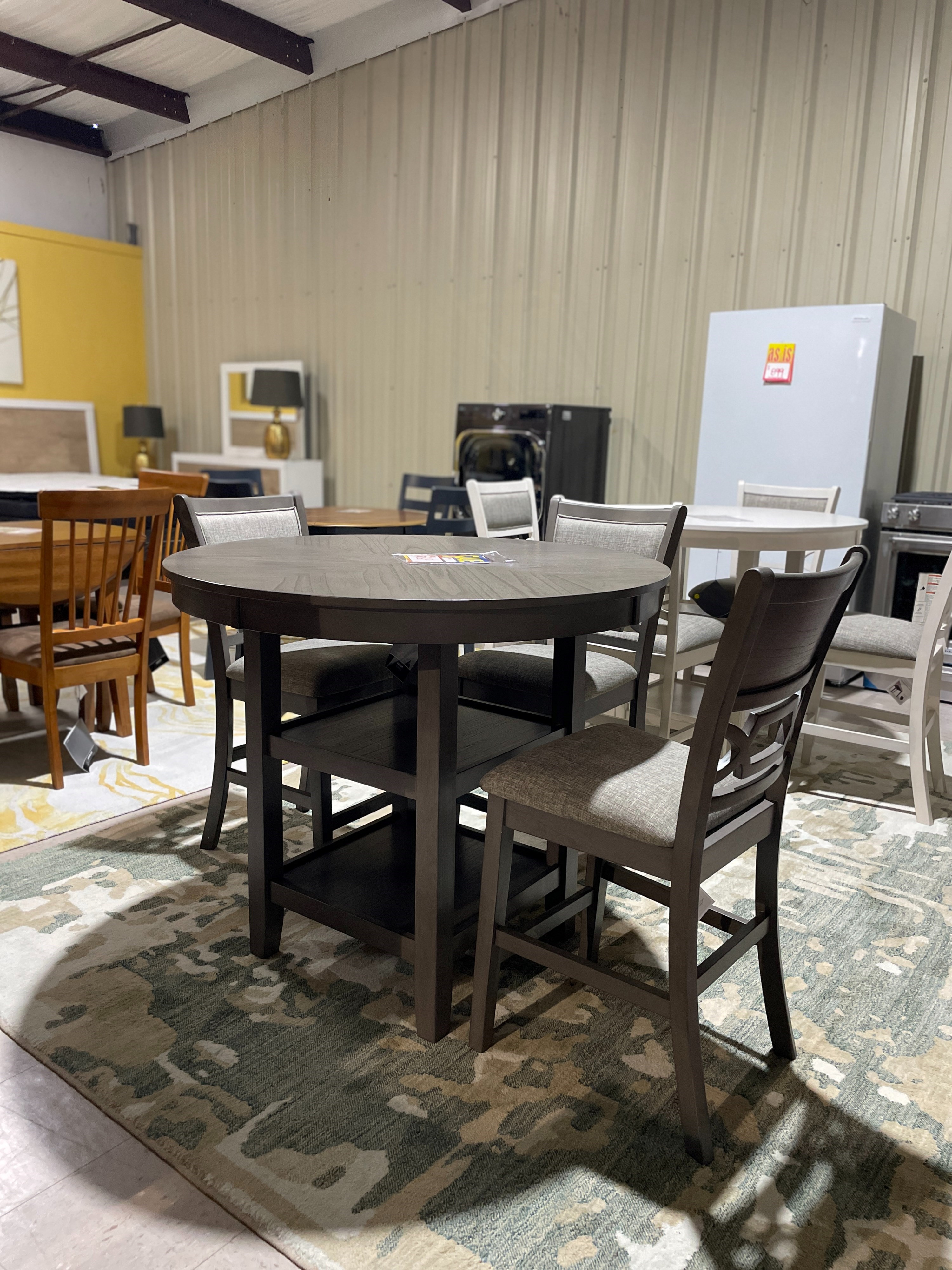 Wrenning Collection Counter Height Dining Table and 4 Barstools by Signature Design by Ashley