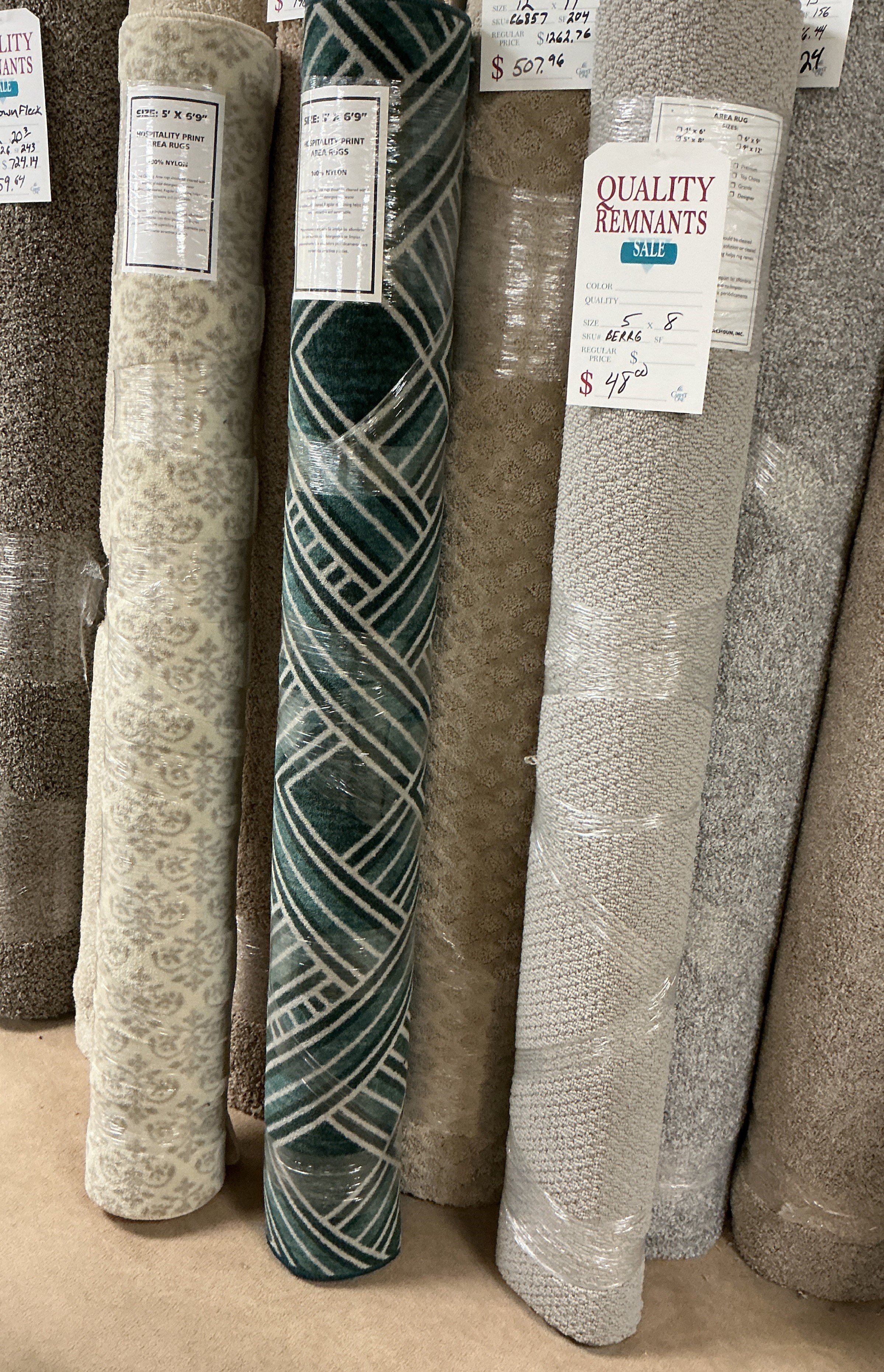 5x8 area rug. Different patterns. Solids. Browse variety in store!