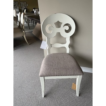 SCROLL BACK UPH SIDE CHAIR
FINISH: CHIPPED WHITE
Constructed of hardwood solid.
Upholstered seat height: 19 1/2"
Upholstered with 100% Polyester Performance Fabric
Cleaning code: W
Dimensions: 20.75"W X 23.50"D X 40.75"H