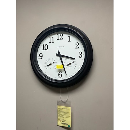 HOWARD MILLER | BAYSHORE OUTDOOR WALL CLOCK | 18" DIA X 2.25" H | OIL-RUBBED BRONZE FINISH | INCLUDES GLASS COVER AND RUBBER SEALS TO PROTECT INSIDE OF CLOCK FROM WEATHER | OFF-WHITE DIAL IS HIGHLIGHTED IN BLACK ARABIC NUMERALS | THERMOMETER FOR TEMPERATURE | HYGROMETER FOR HUMIDITY | QUARTZ, BATTERY-OPERATED, REQUIRES ONE AA SIZED BATTERY | WHEN USING OUTDOORS, RECOMMENDED TO HANG CLOCK IN PROTECTED AREA