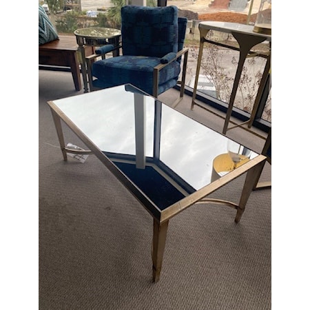 REUAL JAMES

PADOVA COCKTAIL TABLE

Metal Base Table with a luxurious Padova Finish. Table top features a easy to care for antiqued mirror top.

47in W x 25 1/2in D x 20in H