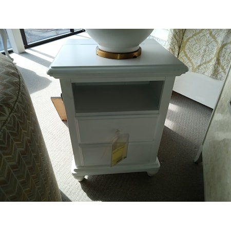 UNIVERSAL FURNITURE- SMARTSTUFF NIGHTSTAND- Creamy white finish. Constructed in select hardwood solids, birch veneers and simulated wood components. Nightstand has 2 drawers and features a top lid that flips up to reveal electrical outlets and a touch switch controls under-mounted nightlight. 21W x18D x 28H  **DISCONTINUED**
  