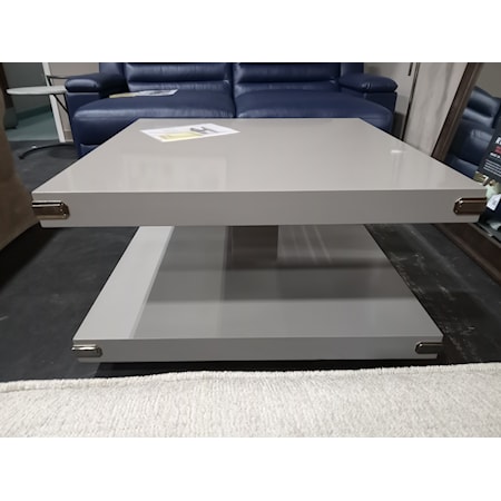 SCHNADIG INTERNATIONAL - SQUARE COCKTAIL TABLE-  36W X 36D X 20H . Finished in a London Fog, high sheen grey paint. Polished silver brackets. * DISCONTINUED*