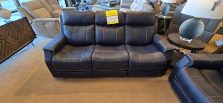 Power reclining sofa with adjustable head tilt. 

If need more seating a matching loveseat with console and recliner maybe available. Supplies limited