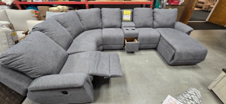 Lazboy manual motion sectional with 2 recliners, storage console and reclining chaise.