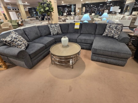 This big comfy 4-piece sectional from England Furniture is perfect for cozying up this time of year! The granite fabric goes great in any room. The upgraded frame are sure to help you relax. 