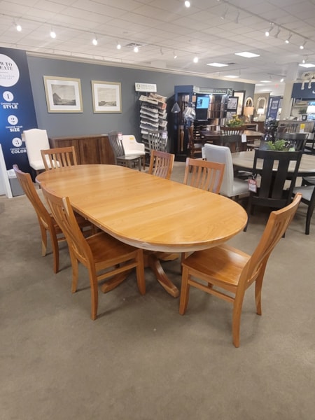 Check out this custom Mavin and Winesburg 42x72 Dining table plus 6 classic chairs.