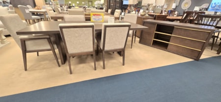 This modern table with upholstered chairs and buffet from Canadel will add a great look to any home! Solid wood in a hazelnut finish with tan upholstered chairs, this 8-piece set is an amazing value! *no additional discount on this item*