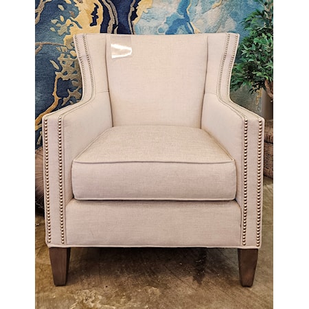 High style accent chair. This modern wing back features nickel colored nail heads reversible seat cushion, with clean tapered wood legs. This is high quality fashion at a great discount!