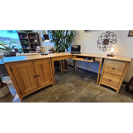 3 piece solid Alder wood "L" shaped desk. The 2 outside pieces can switch sides. Includes: Door cabinet with adjustable shelf inside. 2 drawer file cabinet, corner desk. The finish is a special hardened clear coat.  82" W x 73.5 W