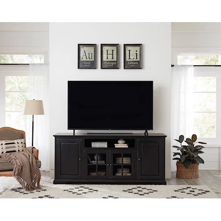 This 74 inch console offers a nostalgic glimpse of the past with a timeless style and fresh, updated finish all while providing much needed storage and function. Features include a sound bar shelf, under top molding with a bracket foot base, mitered doors with paneled inserts, center glass window pane designed doors, adjustable shelving, cutouts in the back for easily accessible cord management, and graphite finished knob hardware.