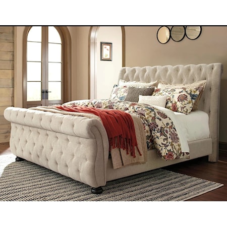 Queen bed.
Relax in luxury with this stately upholstered sleigh bed. Upholstered in a linen colored fabric, It features diamond button-tufting, upholstered side rails, and a classic sleigh shaped headboard and footboard. 