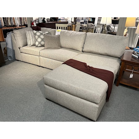 England 4 piece modular sectional consisting of (1) wedge, (2) armless chairs and (1) ottoman as shown in the photo.  