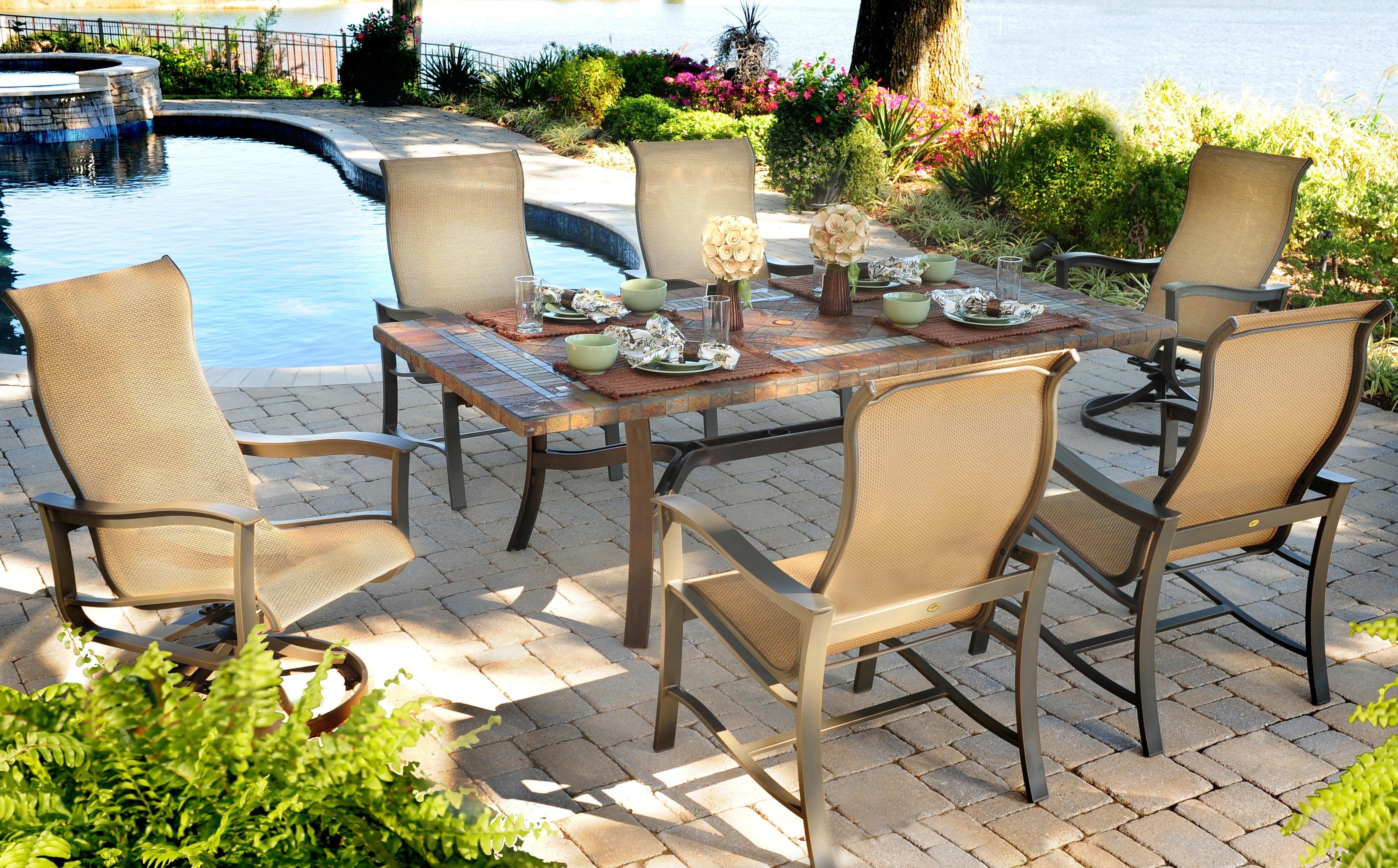Apricity Outdoor Majorca 7 Piece Outdoor Dining Set With 4 Sling Dining Chairs And 2 Sling Swivel Rocker Chairs And 42 By 84 Slate Top Dining Table Find Your Furniture Outdoor Dining Set