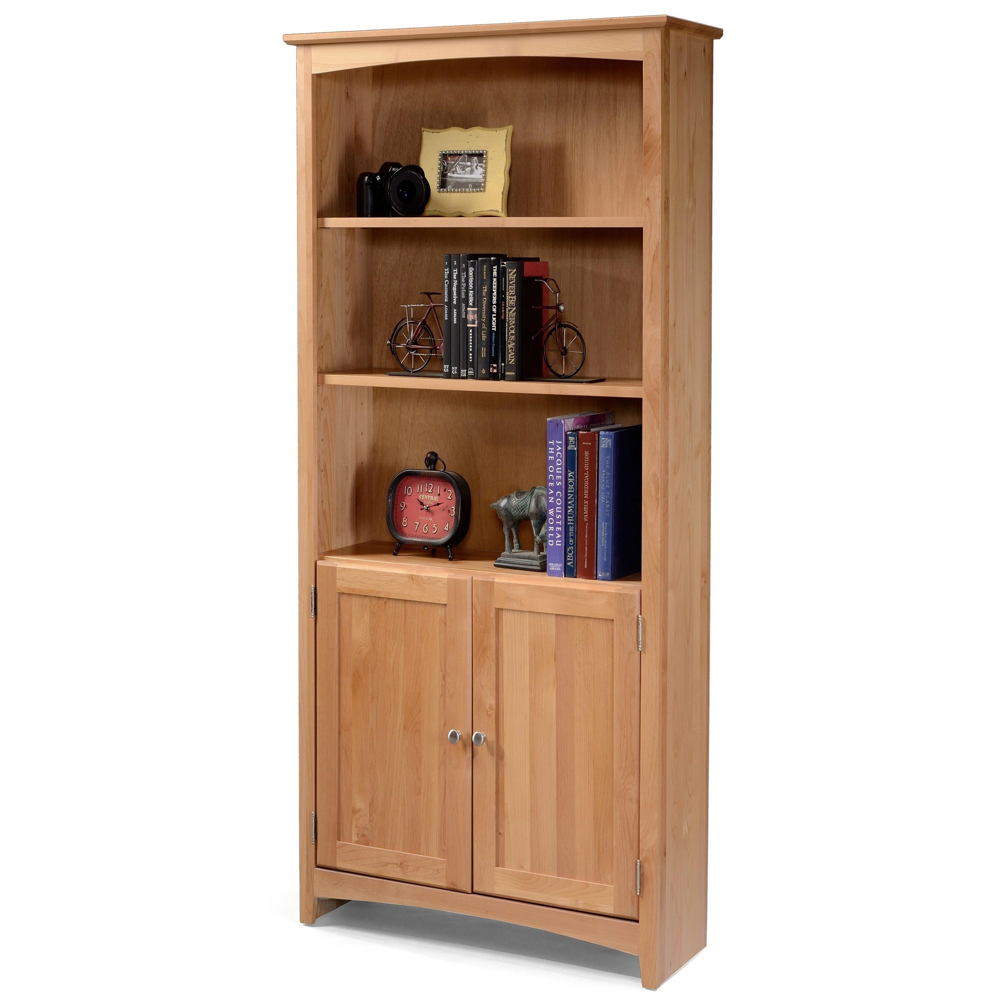 Bookcases Solid Wood Alder Bookcase With Doors And 2 Shelves Sadler S Home Furnishings Combination Bookcases Modern bookcase made of wood and reinforced with solid supports. bookcases solid wood alder bookcase