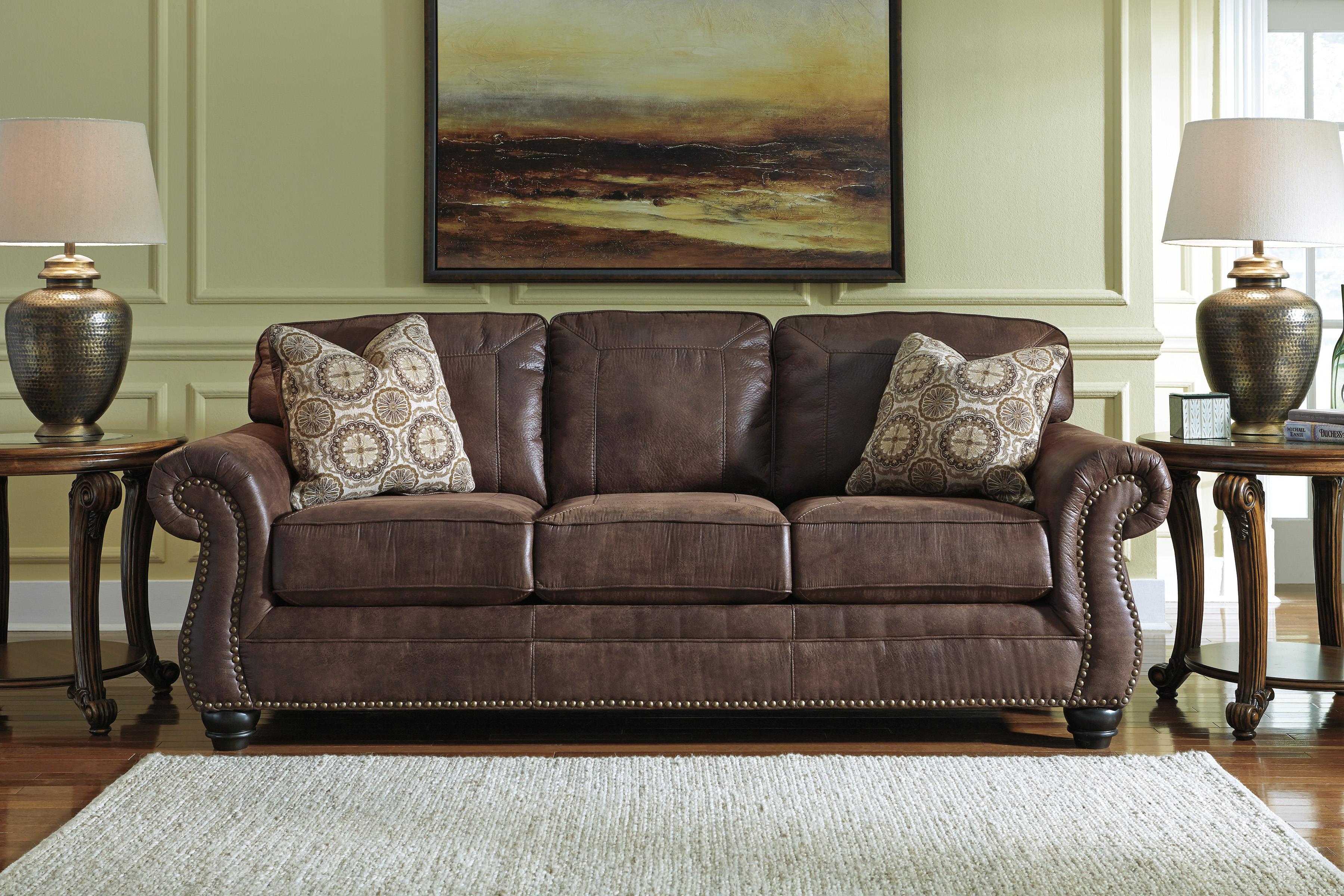 Benchcraft Breville Faux Leather Sofa With Rolled Arms And