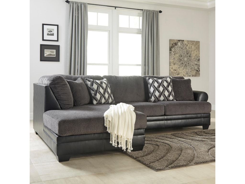 Benchcraft kumasi 2 piece fabric faux leather sectional with left chaise dunk bright furniture sectional sofas