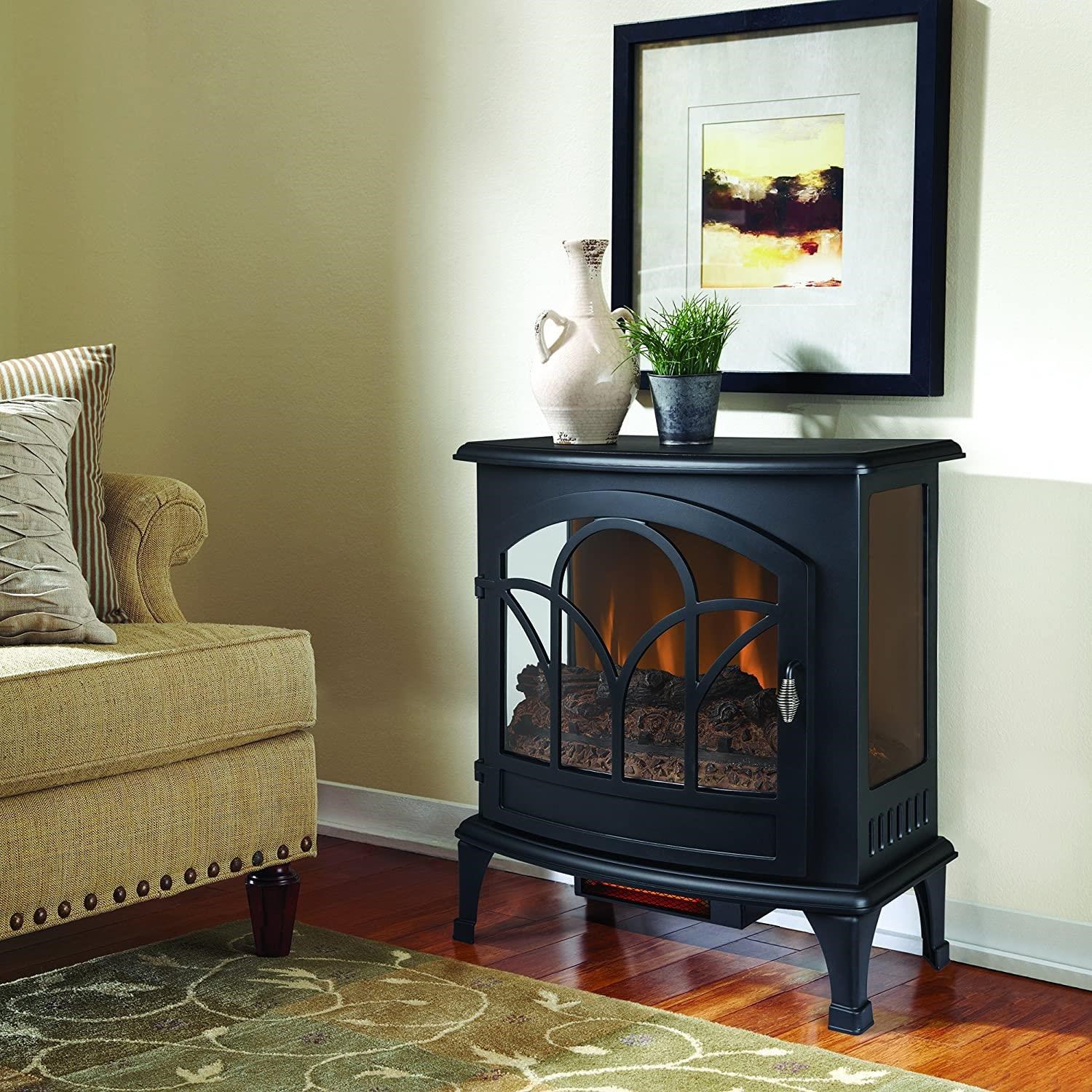 Fina Designs Fireplaces CURVED ELECTRIC STOVE FIREPLACE | Darvin Furniture  | Fireplaces