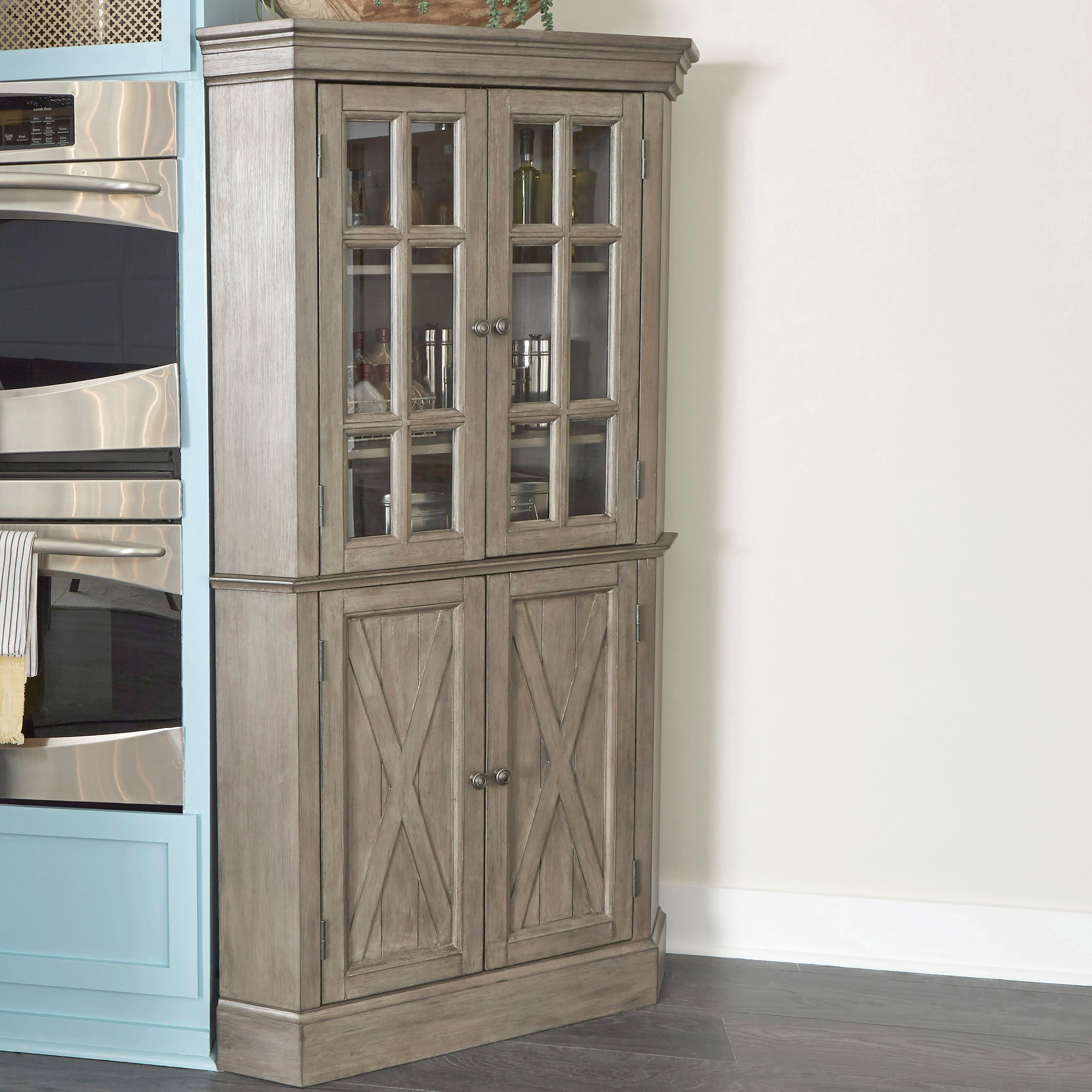 Homestyles Mountain Lodge 5525 68 Farmhouse Corner Cabinet With Adjustable Shelves Sam Levitz Furniture China Cabinets