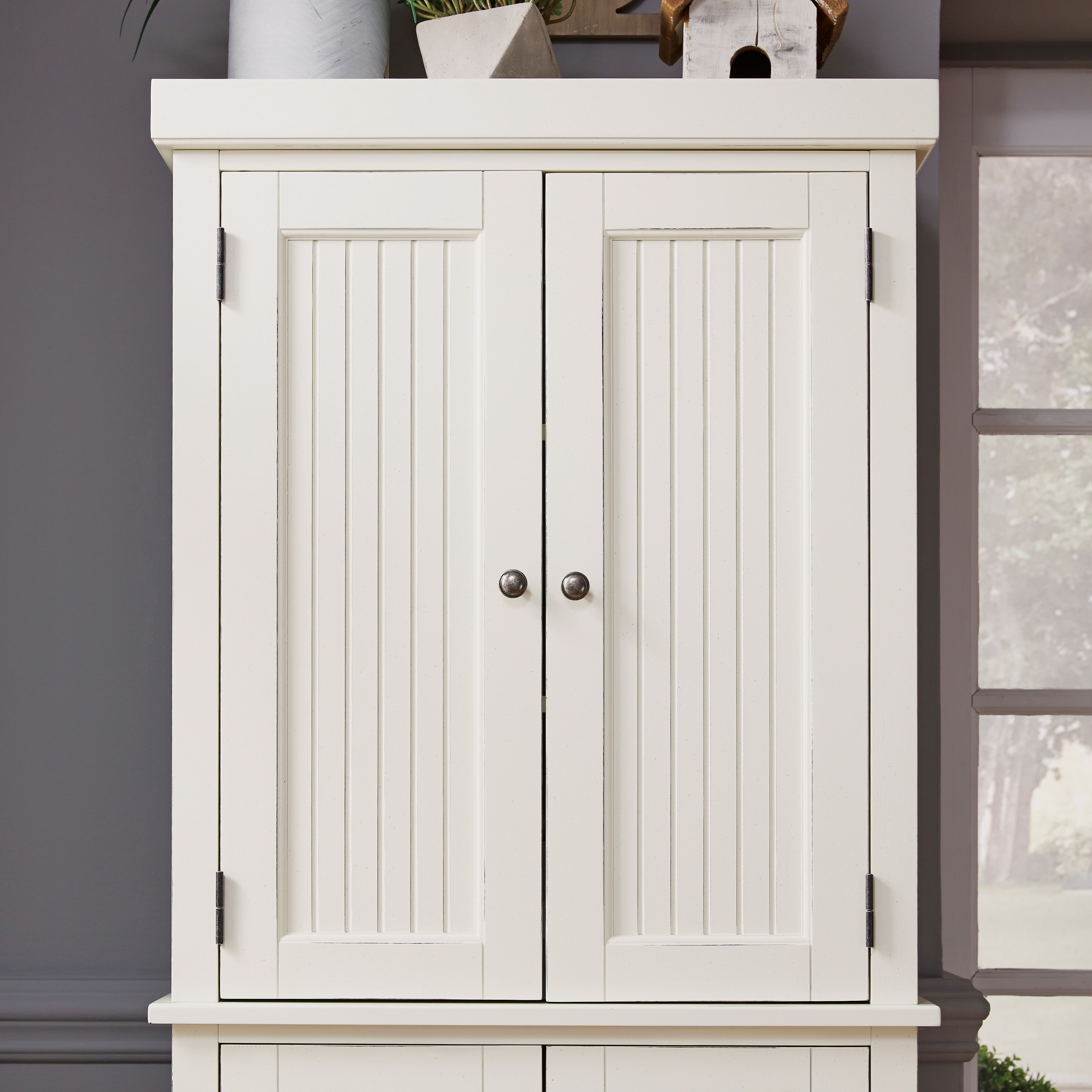 homestyles nantucket coastal pantry with adjustable shelves sam levitz furniture china cabinets
