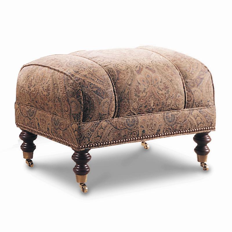 Ottoman with Nailhead Trim and Turned Post Legs with Caster Wheels