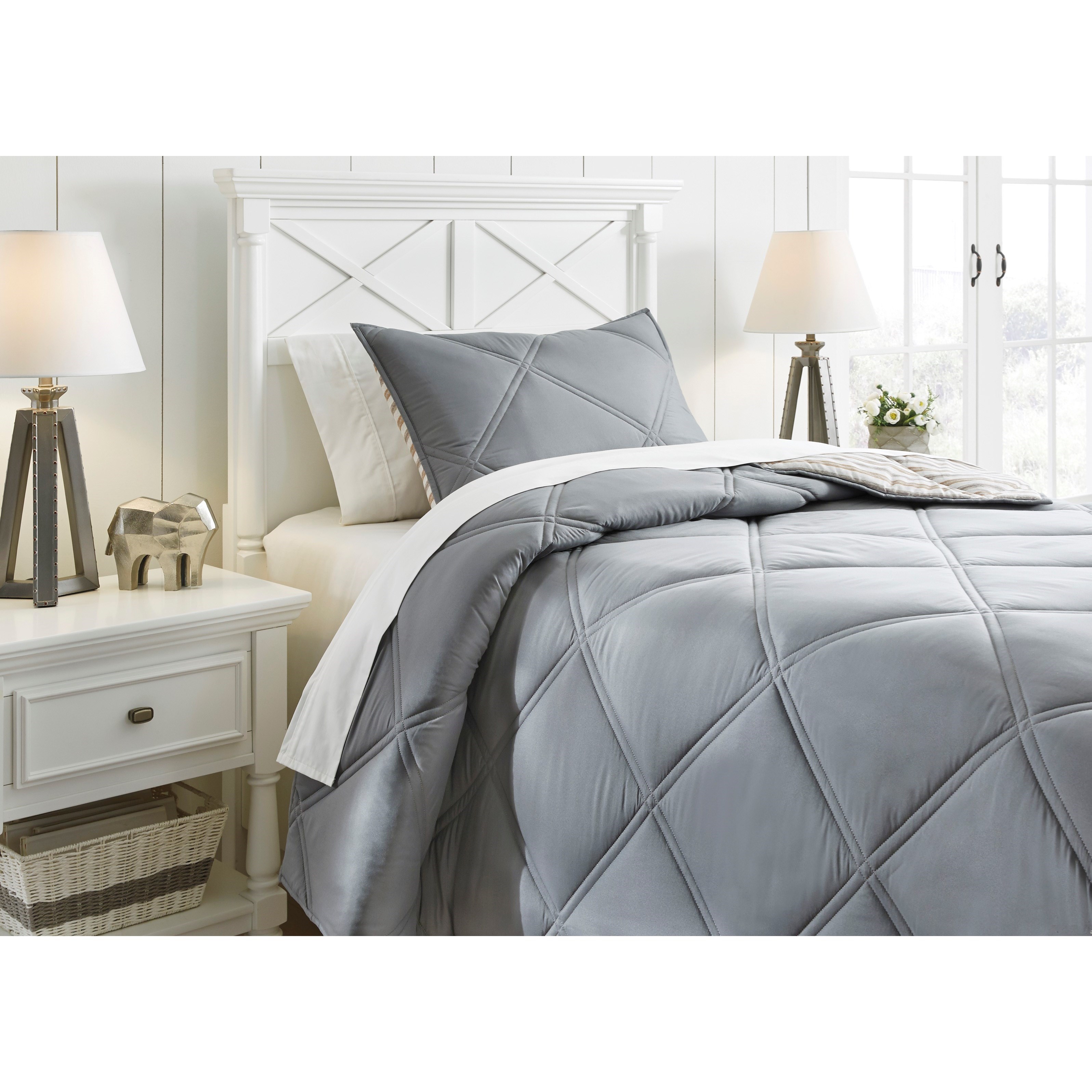 Signature Design By Ashley Bedding Sets Q425001t Twin Rhey Tan Brown Gray Reversible Comforter Set Gill Brothers Furniture Bedding Sets
