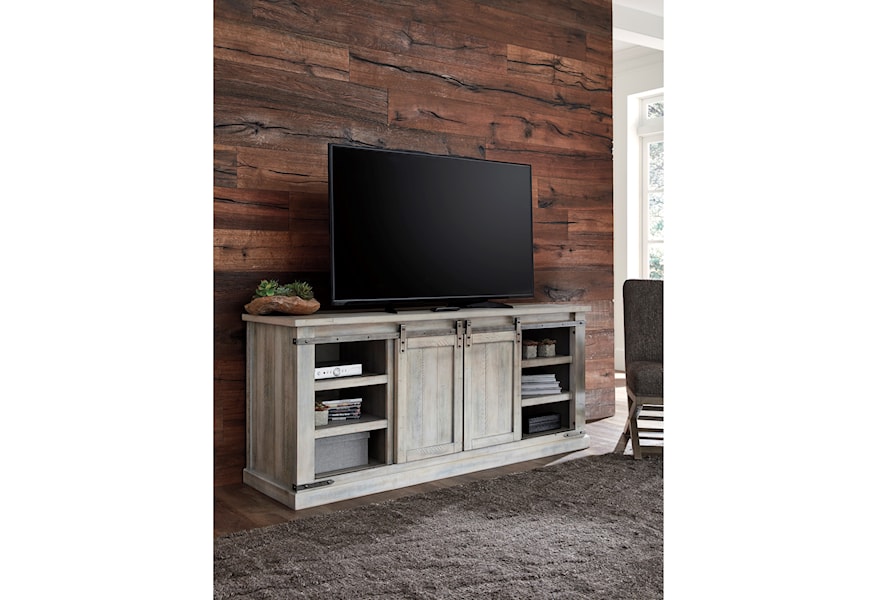 Signature Design By Ashley Carynhurst Rustic White Extra Large Tv Stand With Barn Door Hardware Reid S Furniture Tv Stands