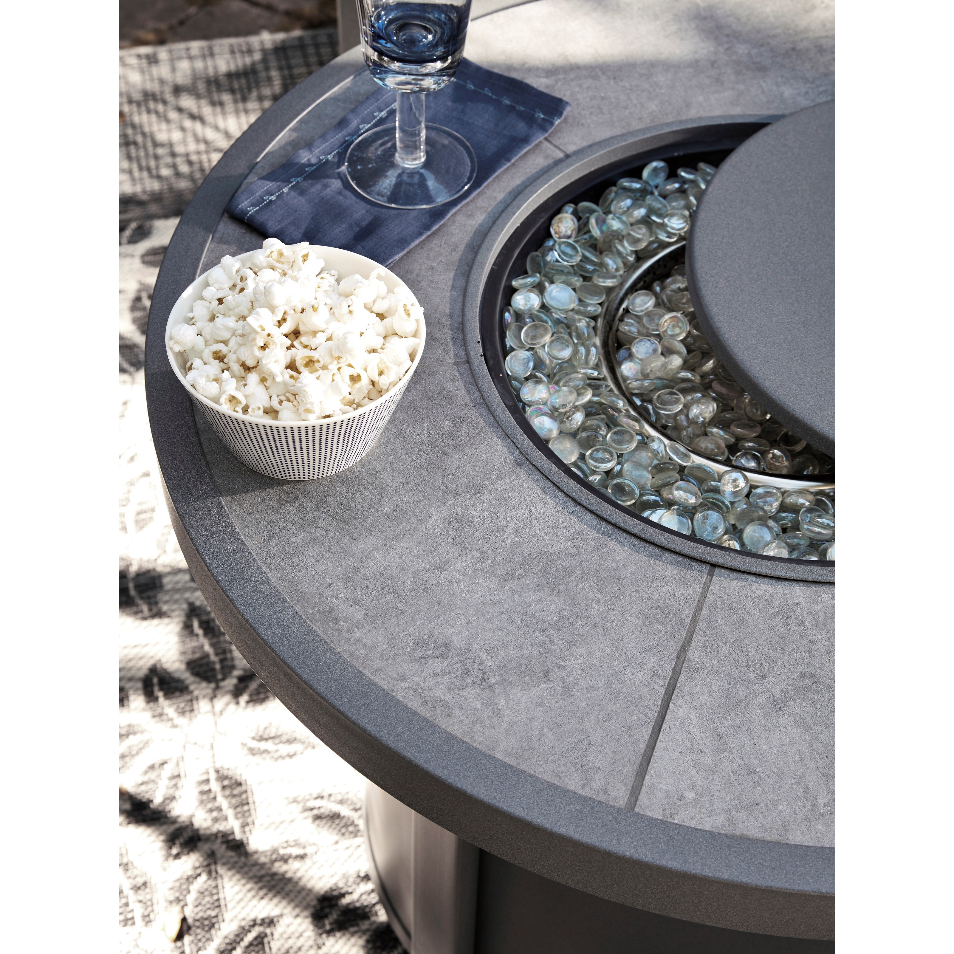 Signature Design By Ashley Donnalee Bay P325 776 Round Fire Pit Table Furniture And Appliancemart Outdoor Fire Pits