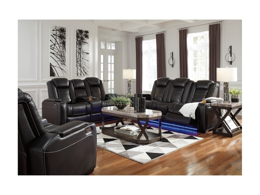Party Time Faux Leather Reclining Sofa W Adjule Headrests Theater Lighting By Signature Design Ashley At Value City Furniture