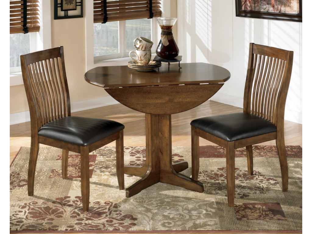Signature Design By Ashley Stuman 3 Piece Round Drop Leaf Table Set Royal Furniture Dining 3 Piece Sets Signature Design By Ashley Stuman 3 Piece Round Drop Leaf Table Set Royal Furniture Dining 3 Piece Sets
