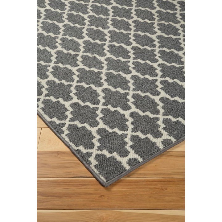 Ashley Furniture Signature Design Casual Area Rugs R402131 Nathanael Gray Tan Large Rug Del Sol Furniture Rugs