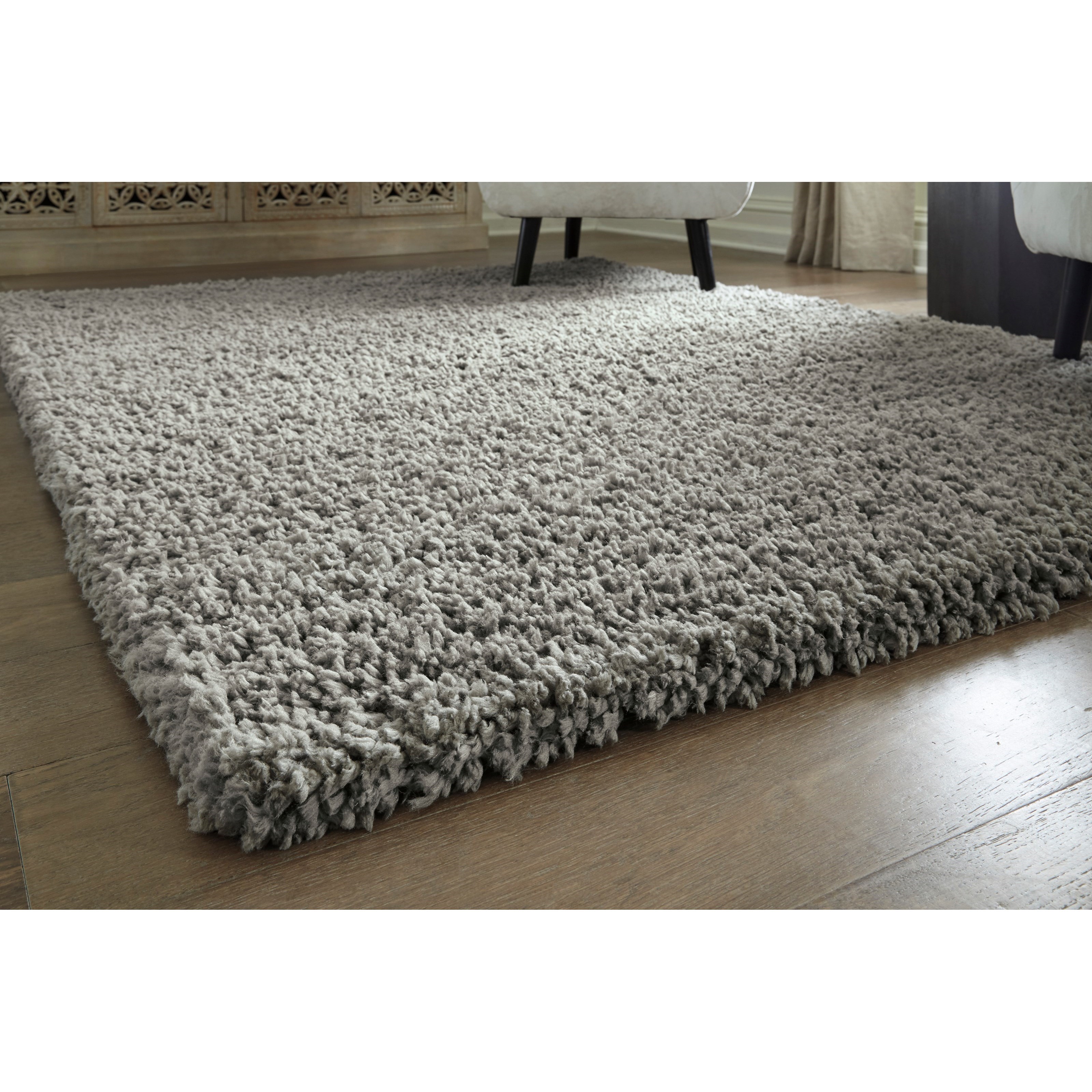 Signature Design By Ashley Casual Area Rugs R404352 Deion Taupe Medium Rug Furniture And Appliancemart Rugs