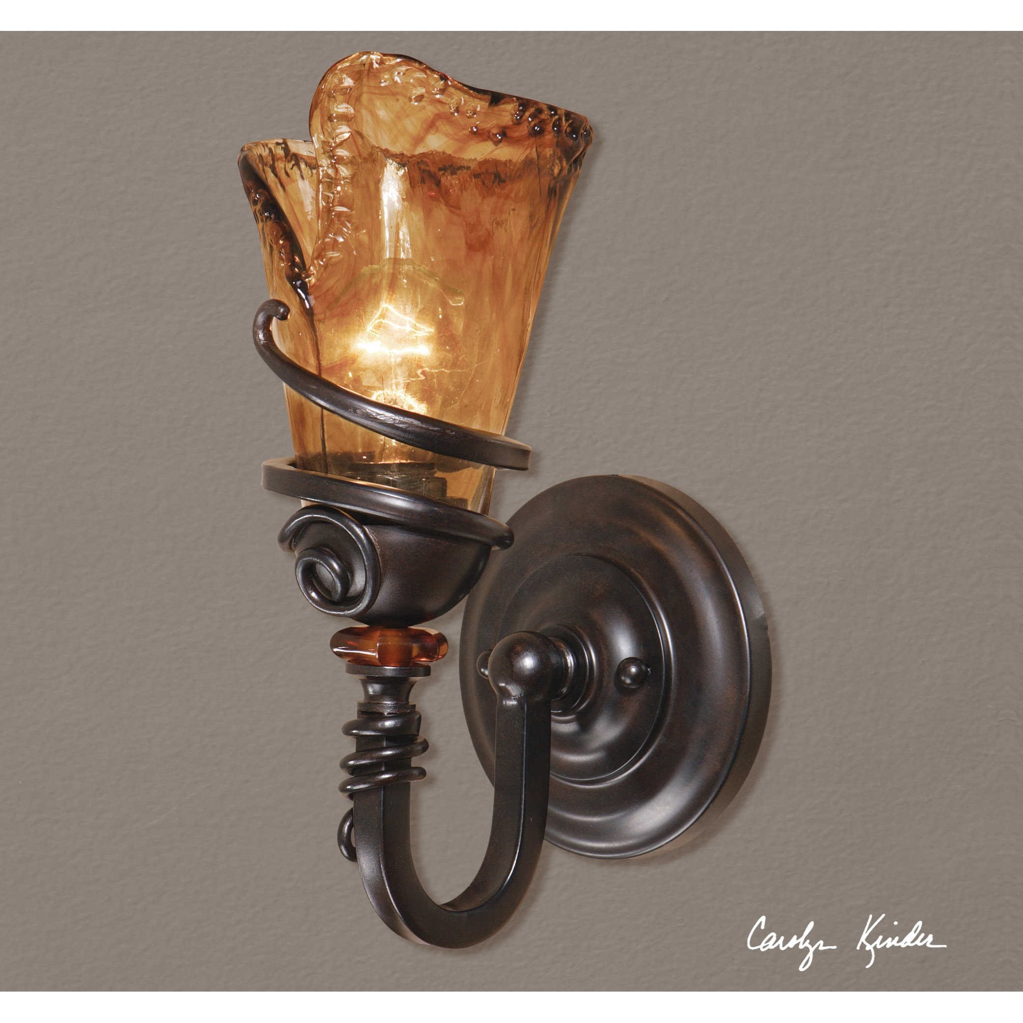 1 light vanity Rubbed Bronze sconce with amber hand blown glass*